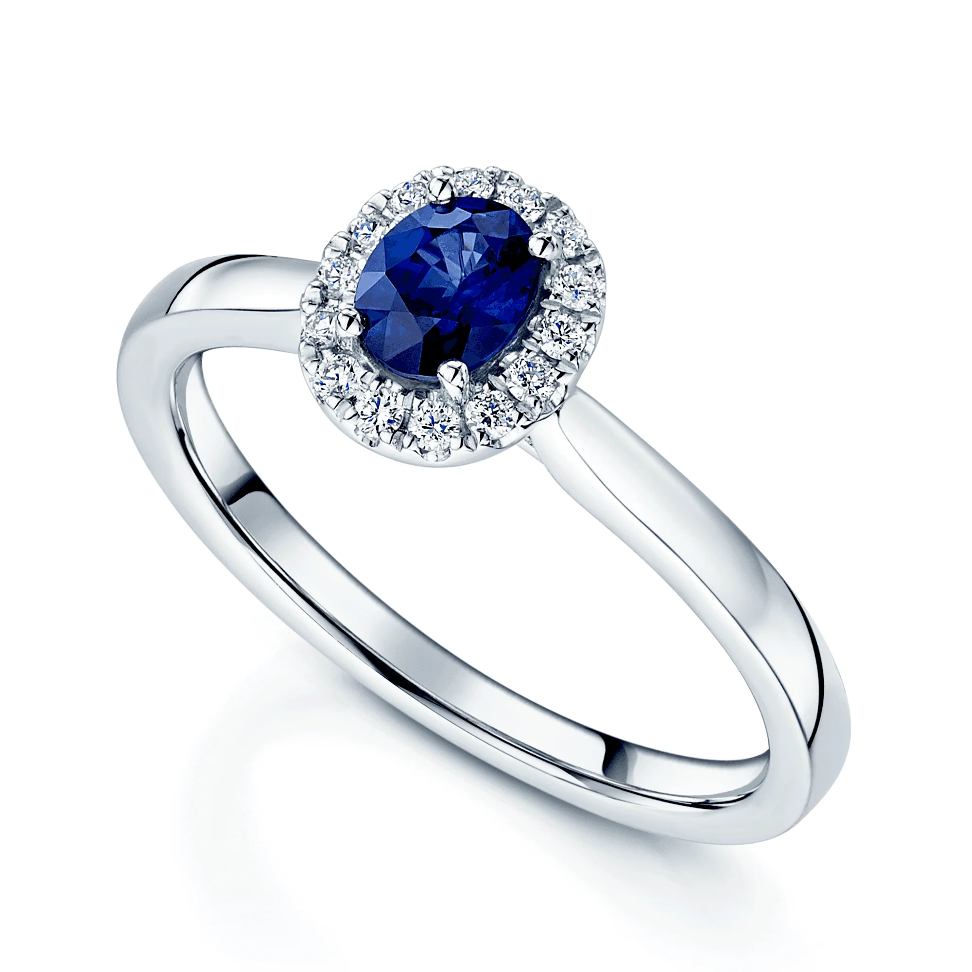Platinum Oval Sapphire And Diamond Halo Ring