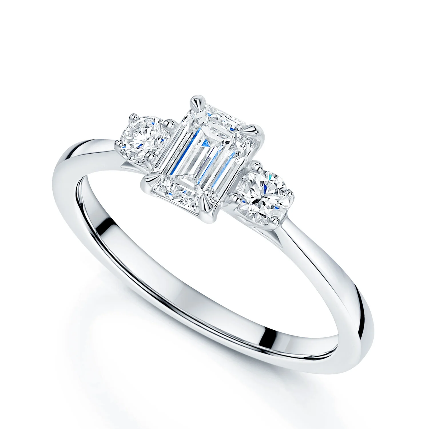 Platinum Emerald Cut And Round Brilliant Cut Diamond Three Stone Ring