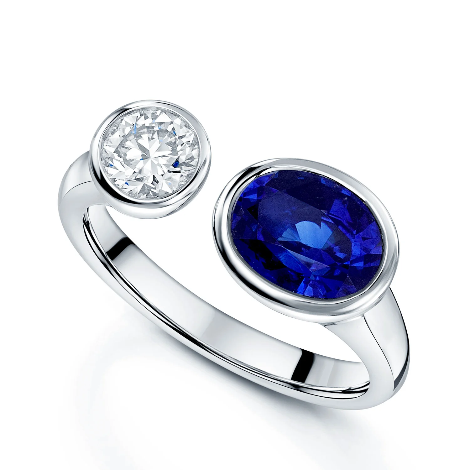 Platinum Toi Et Moi Oval Cut Sapphire And Round Brilliant Diamond Two Stone Rub Over Set Ring